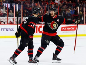 Ottawa Senators defenseman Thomas Chabot (72) celebrates right wing Alex DeBrincat’s goal against the Detroit Red Wings during first period NHL action at the Canadian Tire Centre on Tuesday, Feb. 28, 2023.