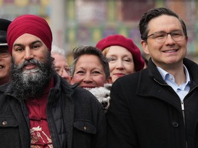 NDP Leader Jagmeet Singh and Conservative Leader Pierre Poilievre during a rare moment of forced cordiality at Vancouver's Lunar New Year Parade.