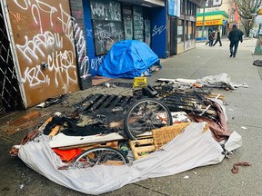 A woman was found dead on Hastings Street Sunday after a fire was extinguished in a tent, one of three in the Downtown Eastside in the past couple of days.