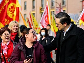 Pierre Poilievre participates in the Chinatown Spring Festival Parade, amid Lunar New Year celebrations, in Vancouver, British Columbia, Canada, January 22, 2023. REUTERS/Jennifer Gauthier