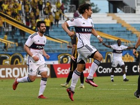 Vancouver Whitecaps' striker Simon Becher celebrates after scoring against Real España during the CONCACAF Champions League second leg football match at the Olimpico Metropolitano stadium in San Pedro Sula last week.