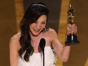 Michelle Yeoh accepts the Oscar for Best Actress for "Everything Everywhere All at Once" during the Oscars show at the 95th Academy Awards in Hollywood on March 12, 2023.