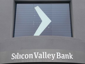 A Silicon Valley Bank sign is shown at the company's headquarters in Santa Clara, Calif., Friday, March 10, 2023. The Federal Deposit Insurance Corporation is seizing the assets of Silicon Valley Bank, marking the largest bank failure since Washington Mutual during the height of the 2008 financial crisis. The FDIC ordered the closure of Silicon Valley Bank and immediately took position of all deposits at the bank Friday.