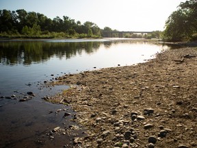 Drought-stricken American River is pictured near the Glenbrook Park River Access near Sacramento, Calif., in May 2021.