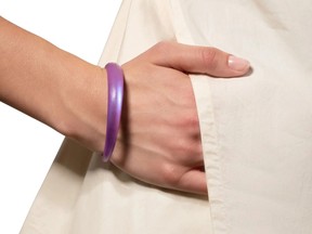 Alexis Bittar tapered lucite bangle, $155 at Blue Ruby, blueruby.com.
