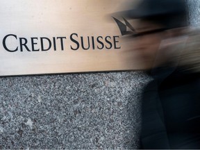 A man walks near Credit Suisse bank headquarters in New York City, U.S., March 15, 2023.