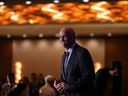 Outgoing B.C. Premier John Horgan leaves the stage at a B.C. Chamber of Commerce luncheon on his last full day as premier of the province, in Vancouver, on Thursday, Nov. 17, 2022. Horgan has officially resigned his Victoria area seat in the British Columbia legislature.