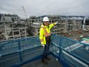 LNG Canada CEO Jason Klein stands atop a receiving platform overlooking LNG processing units called trains that are used to convert natural gas into liquefied natural gas at the LNG Canada export terminal under construction, in Kitimat.