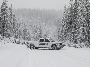 An RCMP truck is shown near Houston, B.C., on Thursday, Jan. 9, 2020. The RCMP say officers arrested five people Wednesday while executing a search warrant at two camps located in the area where a natural gas pipeline is under construction in northwestern British Columbia.