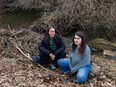 Laura Pandolfo (left) of Climate Crisis Langley Action Partners and Brit Gardner of the West Creek Awareness Group, at a breached beaver dam on the West Creek off of 272nd Street in the Gloucester Industrial Park in the Township of Langley on March 7, 2023. The pair believe beaver dams in the area are being dismantled in order to drain wetlands in order to make room for further industrial development.