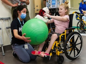 Lily Carlson, 5, attends the Teddy Bear Clinic at B.C. Children's Hospital in Vancouver on March 30.