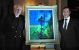 Michael Audain, left, and Audain Art Museum director Curtis Collins unveil the Emily Carr painting Survivor at the Vancouver Club March 15, 2023.