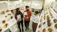 Eric Hammer students Lily Kong-Waller, Mathew Fu and Teresa Chen inside Gordon and Leslie Diamond Health in Vancouver.