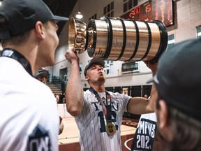 Henry Rempel of Trinity Western University celebrates the Spartans capturing their fourth U Sports men's national volleyball title in seven years by defeating Sherbrooke 3-0 in Sunday's final at McMaster in Hamilton.