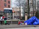 Tents set up on Vancouver's East Hastings Street on March 26, 2023, the same day the B.C. government announces 330 new homes for the Downtown Eastside.
