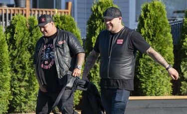 Member of the Hells Angels arrive at the Nanaimo Hells Angels' clubhouse in Nanaimo, BC, July, 20, 2018.