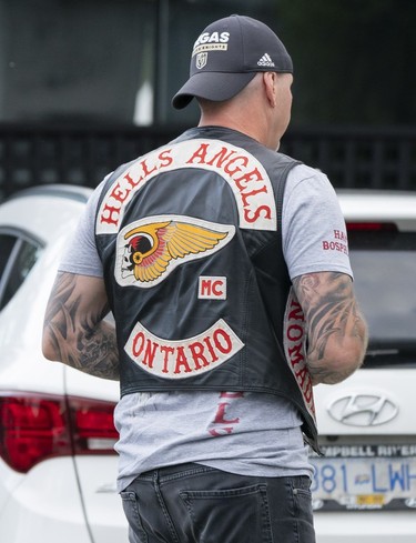 Member of the Hells Angels from Ontario arrives at the Nanaimo Hells Angels' clubhouse in Nanaimo, BC, July, 20, 2018.