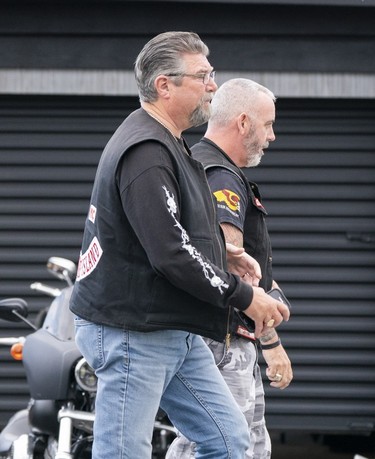 Member of the Hells Angels from PEI arrives at the Nanaimo Hells Angels' clubhouse in Nanaimo, BC, July, 20, 2018.