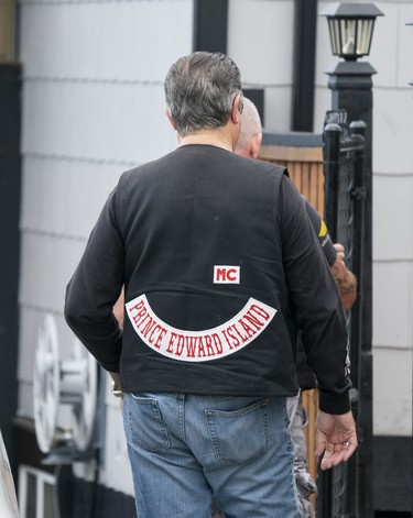 Member of the Hells Angels from PEI arrives at the Nanaimo Hells Angels' clubhouse in Nanaimo, BC, July, 20, 2018.