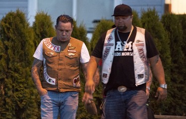 Members of the Hells Angels arrive at the Nanaimo Hells Angels' clubhouse in Nanaimo, BC, July, 20, 2018.