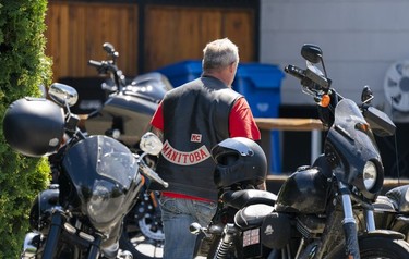 A member of the Hells Angels from Manitoba arrivea at the Nanaimo Hell Angels' clubhouse in Nanaimo, BC, July, 21, 2018.