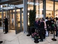 A lineup of customers waiting to enter Nordstrom during its grand opening at Pacific Centre in downtown Vancouver on Sept. 18, 2015.