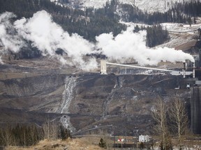 A coal mining operation in Sparwood, B.C., is shown on Wednesday, Nov. 30, 2016. A new study based on three other British Columbia coal mines says the economic benefits from those projects, used to justify their approval during the environmental review process, were "significantly overestimated."