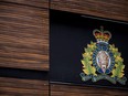 The RCMP logo is seen outside Royal Canadian Mounted Police "E" Division Headquarters, in Surrey, B.C., on Friday April 13, 2018. A man has died in northeastern British Columbia after being hit by a piece of equipment used for snow clearing.