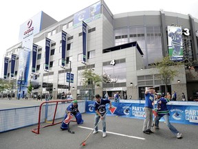 Outside Rogers Arena in its 2011 heyday, 16 years into its existence, as the hometown heroes — that is, the ones who wore skates, not sneakers — make their run to the Stanley Cup Final series that spring.