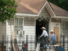 Law enforcement respond to a crime scene where five people, including an 8-year-old child, were killed after a shooting inside a home on April 29, 2023 in Cleveland, Texas. The alleged gunman, who is not yet in custody, used an AR-15 style rifle to shoot his neighbours which also left at least three others injured.