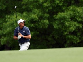 Phil Mickelson of the United States reacts to his second shot on the fifth hole during the second round of the 2023 Masters Tournament at Augusta National Golf Club on April 07, 2023 in Augusta, Georgia.