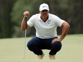 Brooks Koepka of the United States looks over a putt on the 18th green during the second round of the 2023 Masters Tournament at Augusta National Golf Club on April 07, 2023 in Augusta, Georgia.