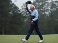 Fred Couples of the United States acknowledges the patrons on the 18th green during the continuation of the weather delayed second round of the 2023 Masters Tournament at Augusta National Golf Club on April 08, 2023 in Augusta, Georgia.
