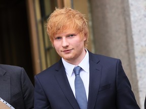 Musician Ed Sheeran leaves after the first day of his copyright-infringement trial at Manhattan Federal Court on April 25, 2023 in New York City. The four-time Grammy winner stands accused of lifting parts of Marvin Gaye's legendary R&B song "Let's Get It On" in his 2014 hit "Thinking Out Loud."