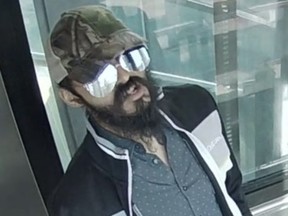 Burnaby RCMP are trying to identify the person in this photo who is a suspect in the April 20 assault of an 89-year-old woman at Metrotown Mall. Credit: Burnaby RCMP