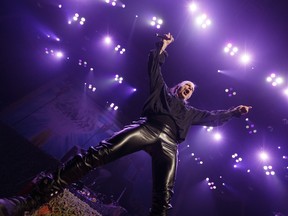 Bruce Dickinson of Iron Maiden performs with the band during its Legacy of the Beast tour stop at Rogers Place in Edmonton, on Friday, Aug. 30, 2019.