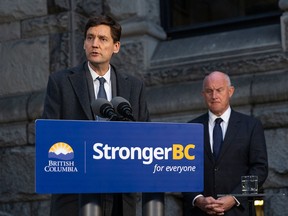 B.C. Premier David Eby and Minister of Public Safety and Solicitor General Mike Farnworth in a recent file photo.