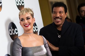 Singers/Songwriters Katy Perry (L) and Lionel Richie attend the Disney ABC Television TCA Winter Press Tour on January 8, 2018, in Pasadena, California. (Photo credit: VALERIE MACON/AFP via Getty Images)