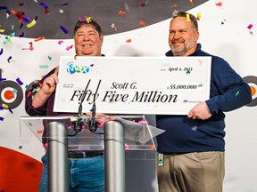 Scott Gurney of Sidney picked up his $55-million cheque on Tuesday, April 4, after winning the Feb. 28 Lotto Max draw.
