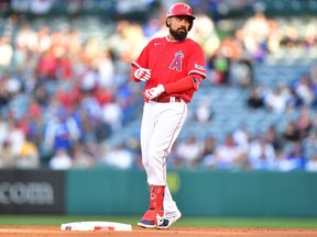 Los Angeles Angels third baseman Anthony Rendon (6) reaches second on an RBI double against the Los Angeles Dodgers during the first inning at Angel Stadium. Gary A. Vasquez-USA TODAY Sports