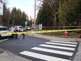 Police officers and paramedics attend the scene of a stabbing onboard a transit bus in Surrey, B.C. on Saturday, April 1, 2023. The victim has returned home from hospital, recovering from an attack that family members say could have easily killed him.THE CANADIAN PRESS/Shane MacKichan