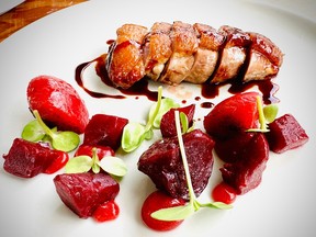 Fraser Valley duck breast with preserved plums and smoked beetroot.