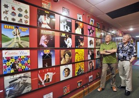 JULY 28, 2009: Red Robinson (right) sold Bruce Allen his giant collection of Elvis records.