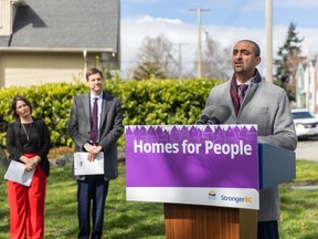 Last week hundreds of B.C. mayors and city councillors heard exactly why Ottawa’s failure tie immigration targets to housing unaffordability is causing grief. (Photo: Housing Minister Ravi Kahlon at an April news conference, while MLA Grace Lore and Premier David Eby listen.)
