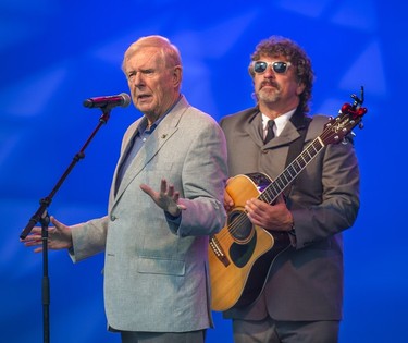 Red Robinson (left) and Revolver (Beatles tribute band) member during a preview 2014 Fair at the PNE Fairgrounds in Vancouver on Aug. 13, 2014.