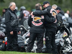 Members of the Hells Angels motorcycle club and affiliated club members gathered at Ocean View Cemetery in Burnaby on Saturday to pay their respects to late member David Swartz. Held every year, the Screwy Ride sees hundreds of bikers gathering for the event. Photo: Jason Payne