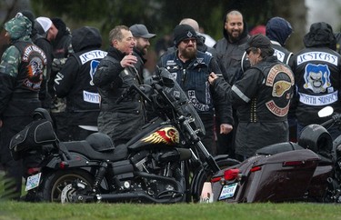 Lacking a clubhouse in East Vancouver to congregate at due to its recent seizure by the government, members of the Hells Angels motorcycle club and affiliated club members gathered at Ocean View Cemetery in Burnaby, BC Saturday, April 8, 2023 to pay their respects to late member David Swartz. Held every year, the Screwy Ride sees hundreds of bikers gathering for the event. (Photo by Jason Payne/ PNG)