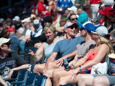 Fans enjoy the warm weather and sunshine as the Vancouver Canadians play the Eugene Emeralds at Nat Bailey Stadium in Vancouver, BC Saturday, April 29, 2023.