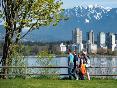 People take advantage of the clear skies and warm weather Saturday at Vanier Park in Vancouver, BC Saturday, April 29, 2023.