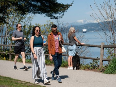 People take advantage of the clear skies and warm weather Saturday at Vanier Park in Vancouver, BC Saturday, April 29, 2023.
